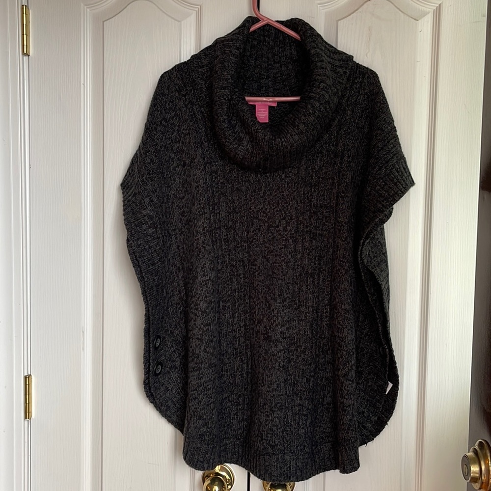 Woman within short sleeve sweater